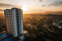 Golden sunrise aerial view near the apartment housing in Bandar Seri Putra, Malaysia.